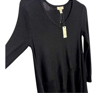 Black asymmetrical top with metallic thread size medium